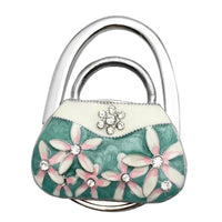 Découvrir le modèle green Accroche sac à main lys sac luxe - modèle green - AccrocheMonSac ™