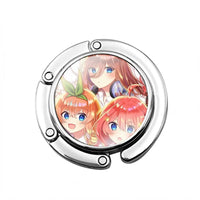 Accroche sac à main Les Quintuplées - modèle images 11 - AccrocheMonSac ™