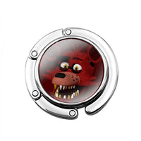 Accroche sac à main It's Me - modèle images 1 - AccrocheMonSac ™