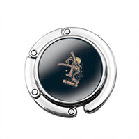 Accroche sac à main Astronaute Skate - modèle images 7 - AccrocheMonSac ™