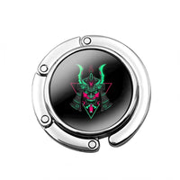 Accroche sac à main Masque vert - AccrocheMonSac ™