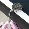 Porte sac et accroches sac à main repliable avec crochet et porte cle