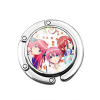 Accroche sac à main Les Quintuplées - modèle images 1 - AccrocheMonSac ™