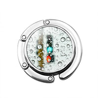 Accroche sac à main Pluie - AccrocheMonSac ™